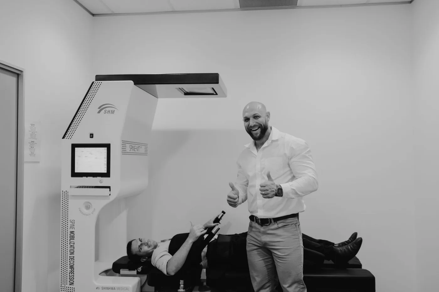 Practitioner with a patient on the MT Core