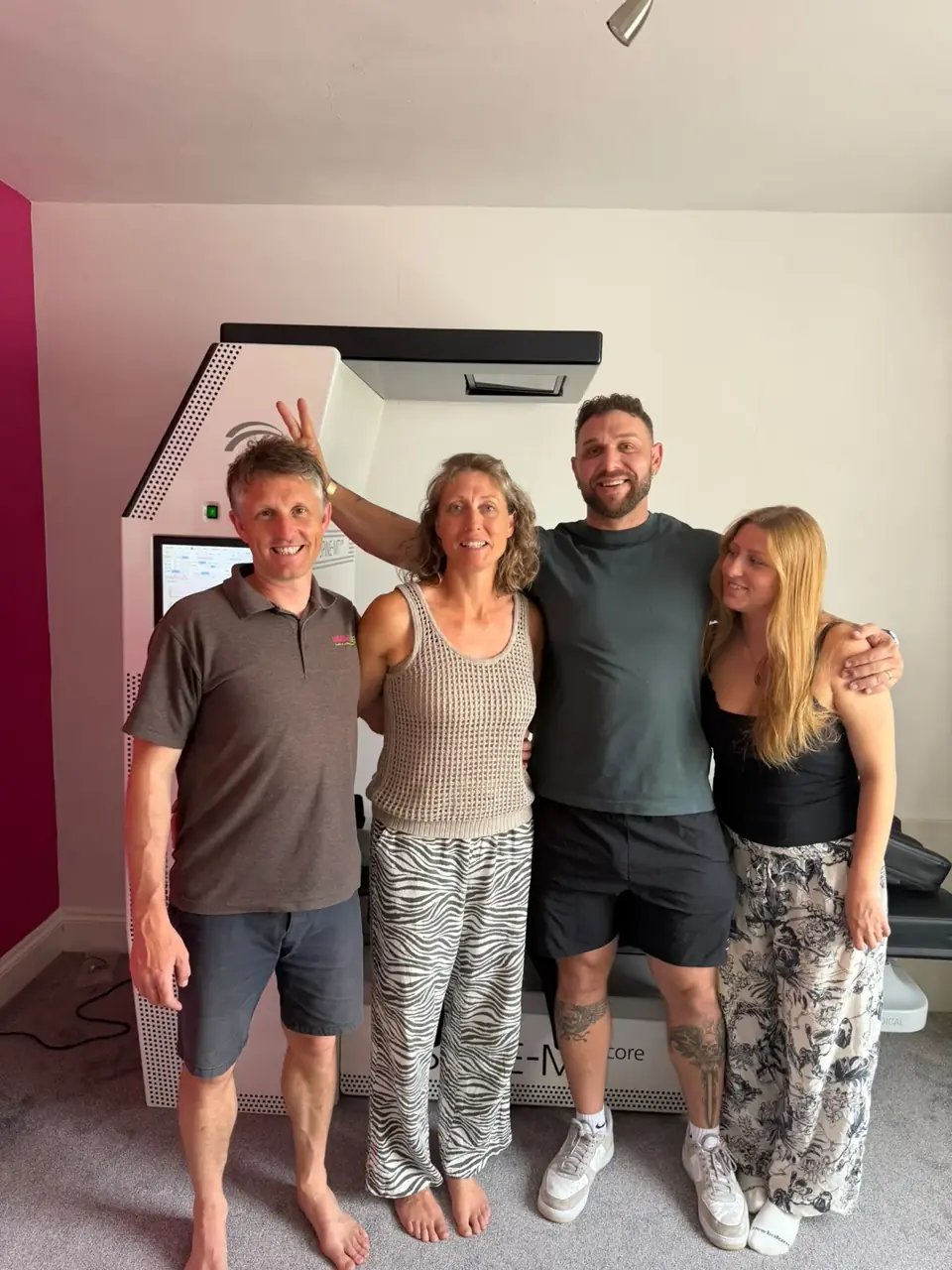 Clinic team celebrating their Spine Series install
