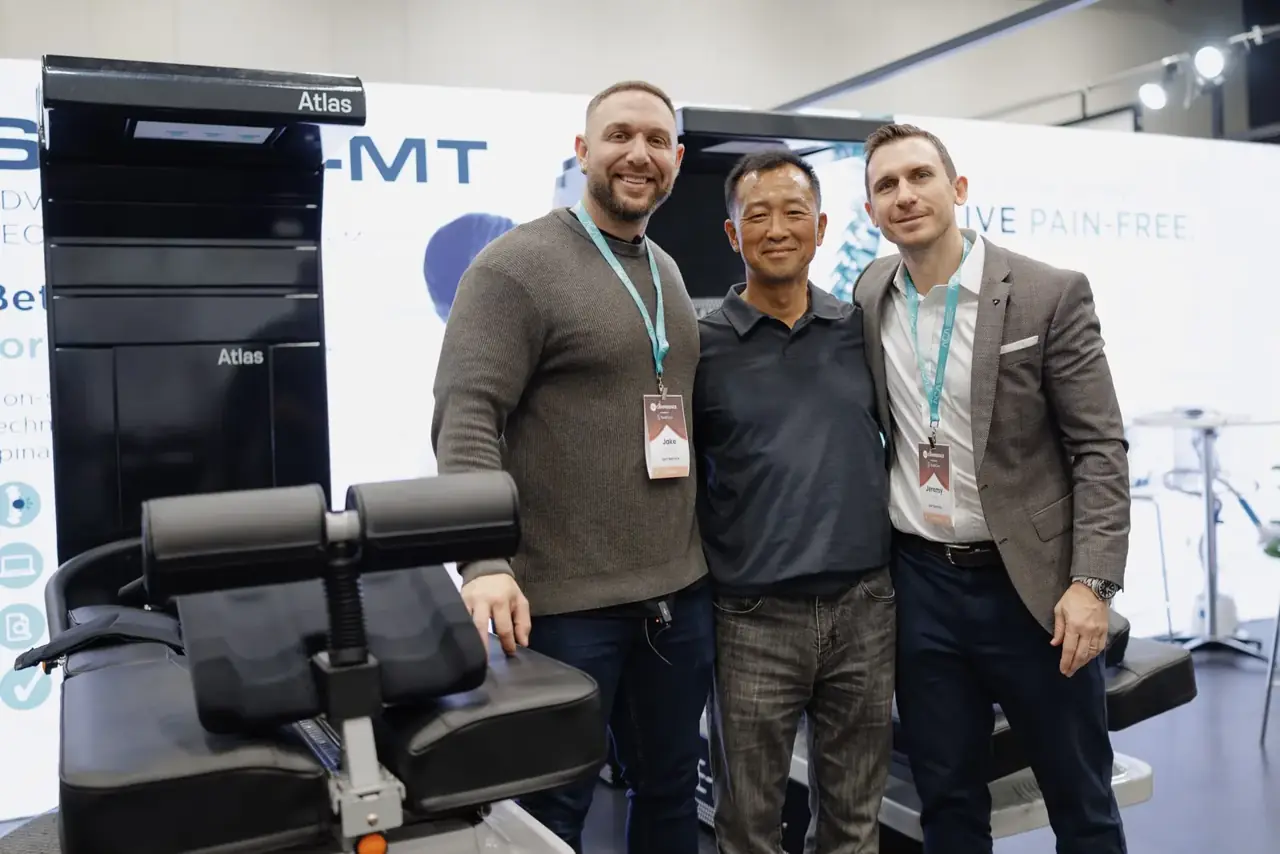The Vert Biotech team at their trade show stand with the MT Atlas